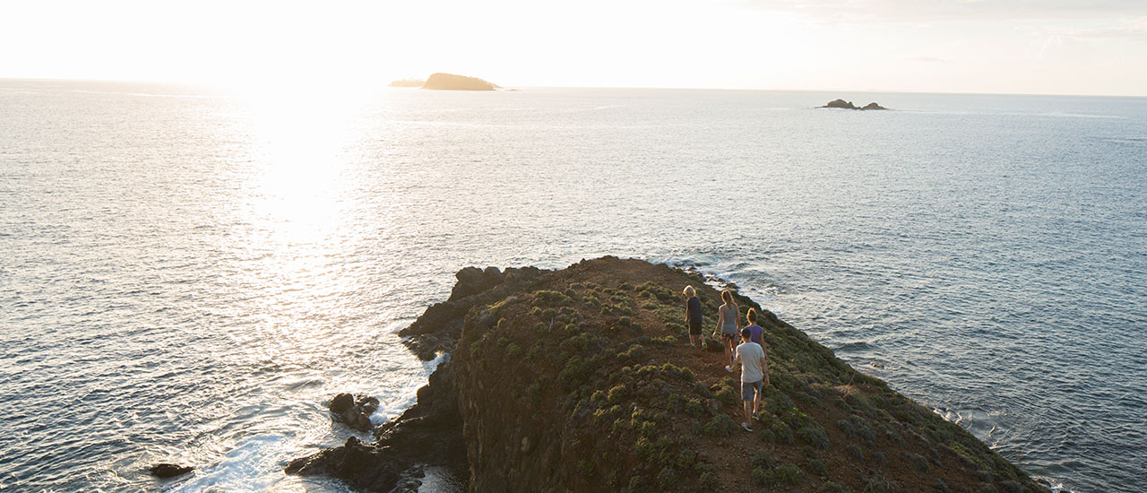 Family hiking bluff overlooking ocean near our panama lodge